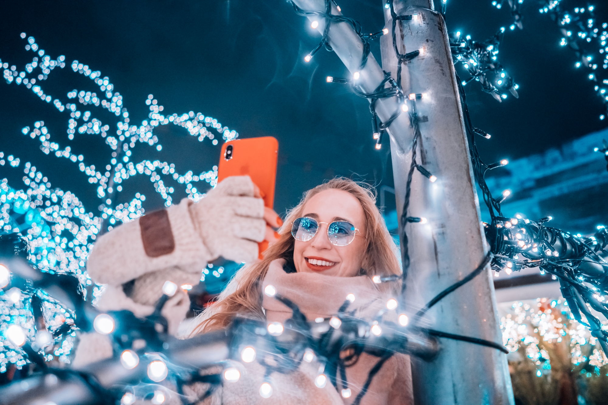 young-woman-posing-street-with-illuminated-trees